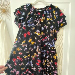 Cute! This dress has bugs on it!